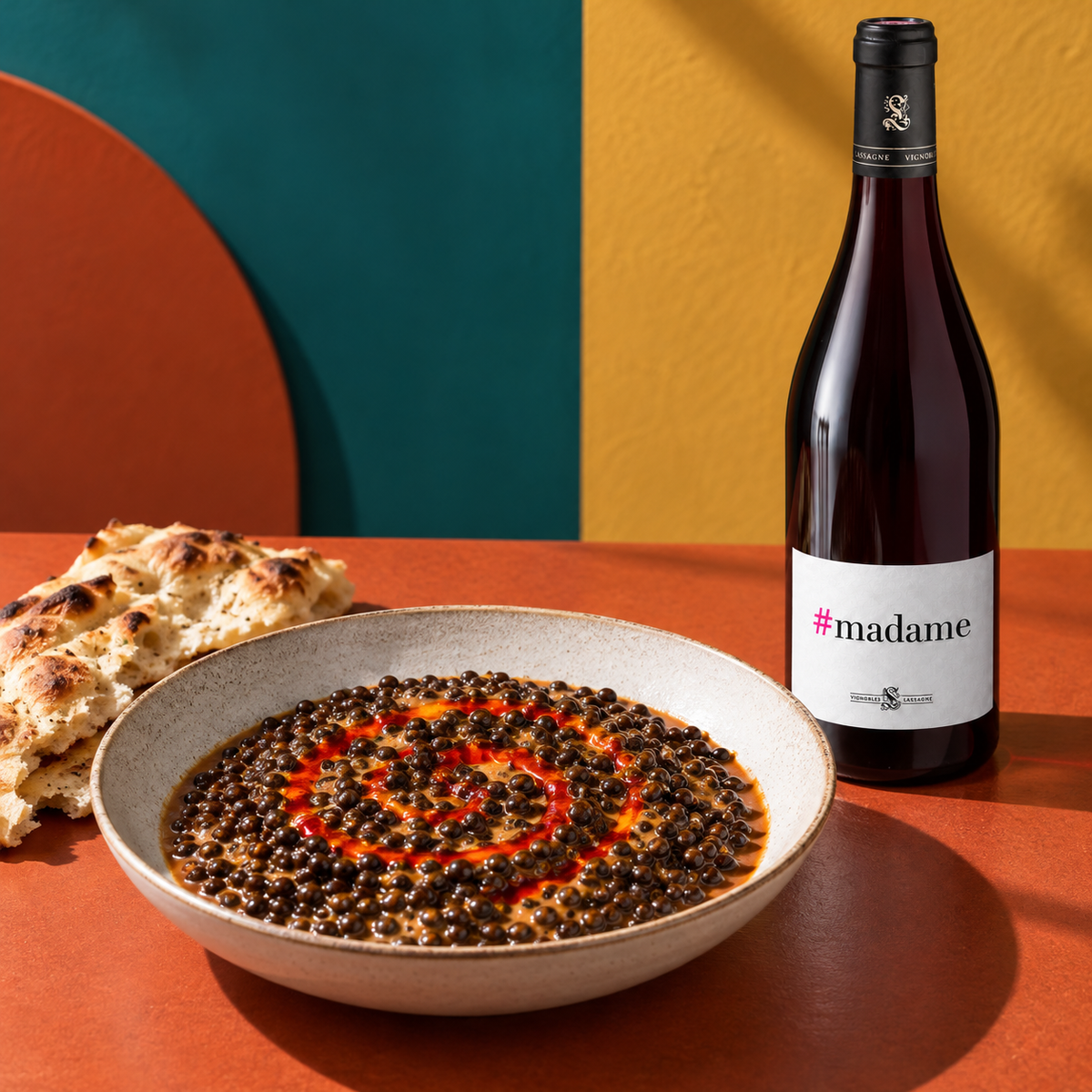 Dark lentils with tomato butter and chilli oil